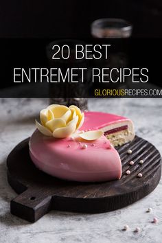 a pink cake with white frosting and a flower on top that says, 20 best entremet recipes