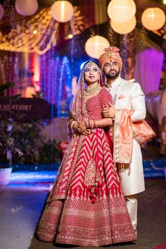 Photo of Contrasting bride and groom with bride in chevron lehenga | Wedding couple poses photography, Indian wedding poses, Indian wedding couple photography Bride Groom Photoshoot, शादी की तस्वीरें, Bride Groom Poses, Indian Wedding Bride, Groom Photoshoot