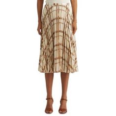 Women's Midi Skirt By Lauren Ralph Lauren! Cream And Tan Multi-Color. Metallic Shimmer. Pleated. Zipper Closure On Side. Size 2 -Flat Waist: 14.5" -Length: 30.5" Size 12 -Flat Waist: 17" -Length: 31.5" Size 14 -Flat Waist: 17.5" -Length: 32.5" Size 16 -Flat Waist: 19" -Length: 33" 100% Polyester. Hand Wash Cold Inside Out. Do Not Bleach. Hang To Dry. Cool Iron If Needed On Reverse Side. Do Not Dry Clean. 5.24 Pencil Skirt Fashion, Metallic Pleated Skirt, Ralph Lauren Skirts, White Denim Skirt, High Waisted Maxi Skirt, Pleat Skirt, Midi Flare Skirt, Tweed Pencil Skirt, Printed Pleated Skirt