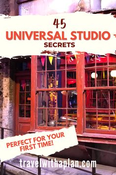 a store front with the words universal studio secrets on it's window and an advertisement for its first time