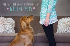 a woman standing next to a brown dog on top of a couch