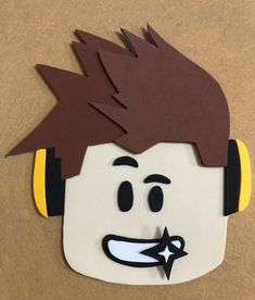 a paper cut out of a man with headphones