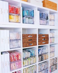 the shelves are filled with many different types of crafting supplies and storage bins