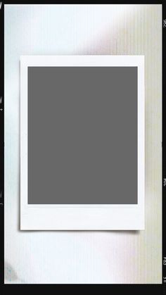 an empty white photo frame on a black and white background