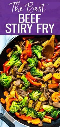 beef stir fry with broccoli and carrots in a pan