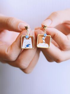 ⭐️ Introducing our kawaii earrings that are added to the new section ENAMEL KAWAII Link to the section on Etsy: https://www.etsy.com/shop/EasternDragonShop?ref=shop-header-name&listing_id=1529609045&from_page=listing&section_id=48840336 ⭐️ The dangles showcase intricately designed cute elements, adding a unique touch to your look. ⭐️ Crafted with hypoallergenic materials, these earrings offer a comfortable and safe wearing experience.  ⭐️ The lightweight design makes them perfect for everyday we Kawaii Earrings, Earrings Dainty, Square Earrings, Cat Earrings, Lovers Gift, Cat Lover Gifts, Cute Cat, Jewelry Earrings Dangle, Cat Lovers