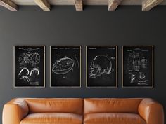 three black and white drawings hang on the wall above a leather couch in a living room