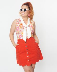 This amazing 1970's style mini skirt from Smak Parlour is an absolute must-have! Crafted in beautiful burnt orange corduroy, it features a button up front and scalloped hemline for added flare. Plus, there are side pockets to store all your essentials! And with sizes XS-4X available while supplies last - don't miss out on this fabulous piece! This plus size skirt pairs easily with a fun printed blouse or a basic tee Smak Parlour Smak Parlour Burnt Orange Campus Mini Skirt | Orange | Skirts | Materials & Care Instructions: ['100% Cotton', 'Hand wash', 'Imported'] Orange White Outfit, 70s Disco Outfit, Neck Tie Top, Conservative Outfits, 2024 Halloween, 70s Outfits, Orange Skirt, Timeless Classic Style, Disco Outfit