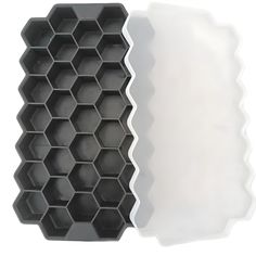 two plastic trays that are shaped like honeycombs