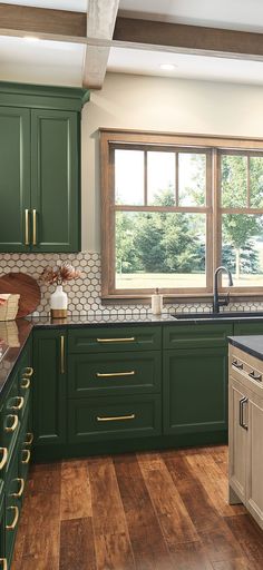 #ThomasvilleCabinetry #ModernKitchen #KitchenRemodel #DreamKitchen #Trend #KitchenInspo Colored Kitchen Cabinets Green, Green Kitchen Farmhouse Style, Interior Kitchen Cabinet Colors, Black And Green Cabinets Kitchen, Green And Gold Cabinets Kitchen, Green Kitchen Cabinets Apartment, Charleston Green Cabinets, Kitchen Cabinets Same As Wall Color, Viridian Green Kitchen