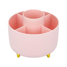 a pink cup holder with four cups in it