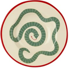 a plate with a green snake on it