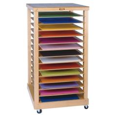 a wooden literature stand with many different colored folders on it's sides and wheels