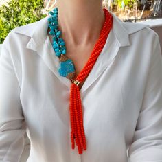 Turquoise and orange crystal layered necklace with long fringe pendant. Chunky statement beaded necklace for women. Large light blue and orange handmade necklace. Bohemian bright necklace in gold color are suitable for an casual look, evening look and for a holiday. These necklace will be a good Christmas, anniversary, wedding or birthday gift for women, mom, wife, girlfriend, sister or daughter. Women's necklace with stone. It emphasizes the beauty of your neck and adds charm to your look. FAST Bright Necklace, Modern Necklace, Birthday Gift For Women, Orange Crystals, Long Fringe, Long Fringes, Beaded Wedding, Fringe Necklace, Beaded Statement Necklace