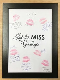 a framed poster with lipstick on it that says kiss the miss goodbye