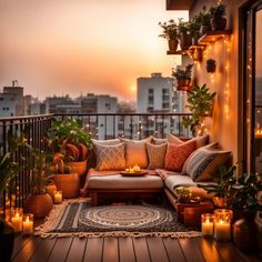 a balcony with lots of potted plants and candles