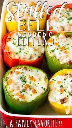 stuffed bell peppers in a red casserole dish with text overlay reading stuffed bell peppers a family favorite