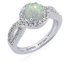 Maybe you're an October baby. Or maybe you're simply enamored with the shimmering beauty of opals. Either way, we think you're going to love this opal ring that's accented with a sprinkling of dazzling cubic zirconia Diamonique simulated diamonds. October Baby, Opal Ring, Halo Ring, Halo Rings, Ring Sterling Silver, Opal Rings, Sterling Ring, Halo, Cubic Zirconia