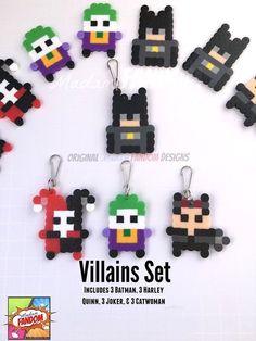 an assortment of pixel keychains made to look like video games characters