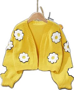 Cute Long Sleeve Spring Cardigan, Playful Knitted Sweater For Spring, Playful Knitted Spring Sweater, Playful Spring Knitted Sweater, Cute Yellow Long Sleeve Sweater, Cute Yellow Sweater For Fall, Cute Yellow Fall Sweater, Playful White Winter Cardigan, Playful Winter Cardigan