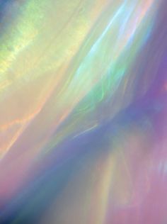 an abstract image of the sun's rays and colors