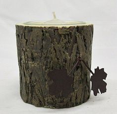 a candle that is sitting on top of a tree stump