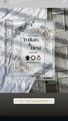 an instagram page with silver and white designs on it