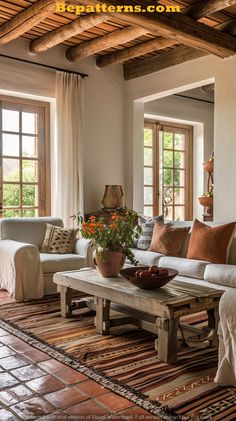 a living room filled with lots of furniture and decor on top of a wooden table