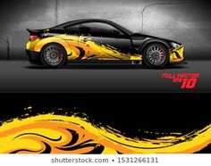 an image of a car painted in yellow and black with flames on the front side