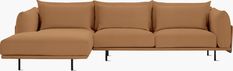 a brown couch with pillows on it