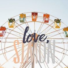 a ferris wheel with the word love on it