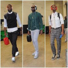 three men wearing headphones walking down the runway in different outfits and colors, all with backpacks on their backs