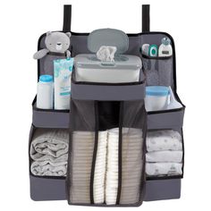 the diaper caddy is filled with baby products and items to keep them organized