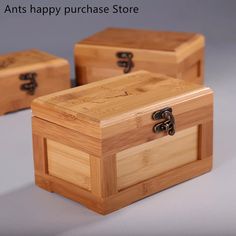 three wooden boxes sitting next to each other on top of a gray surface with text that reads, ants happy purchase store