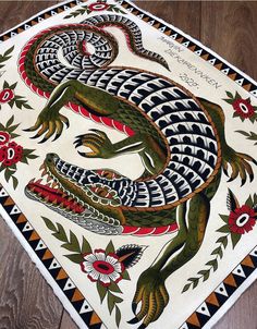 a rug with an image of a lizard on it