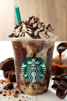 a starbucks drink with whipped cream and chocolate