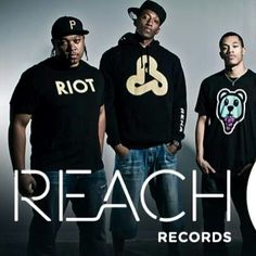 three men standing next to each other in front of a black background with the words reach records on it