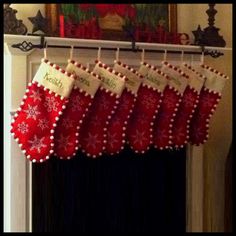 christmas stockings hanging from a fireplace mantel