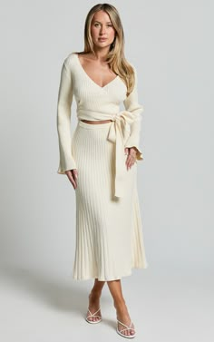 Andreia Midi Dress - Knitted Wrap Long Sleeve Dress in Cream | Showpo USA Chic Beige Midi Length Sweater Dress, Beige Knit V-neck Midi Dress, Cream Color Outfits For Women, Chic Cream Knit Dresses, Elegant Neutral Sweater Dress For Fall, Chic Beige Ribbed Sweater Dress, Elegant Ribbed Midi Loungewear Dress, Elegant Ribbed Midi Dress For Loungewear, Chic Cream Sweater Dress