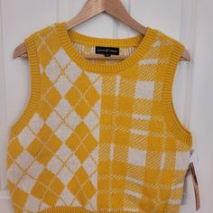 Almost Famous Sleeveless Sweater. Mustard Yellow & White. Size Xl Ptp 19.5". Shoulder To Bottom Hem 20". Smoke Free & Dog Friendly Home. Casual Yellow Sweater Vest For Fall, Yellow Sleeveless Top For Fall, Sleeveless Yellow Sweater Vest For Fall, Yellow Sleeveless Vest For Fall, Trendy Yellow Sleeveless Top, Trendy Yellow Vest Top, Fitted Mustard Sleeveless Top, Casual Yellow Tank Vest, Mustard Fitted Sleeveless Top