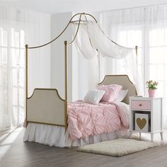 two pictures of a bedroom with white walls and pink bedding, one has a canopy over the bed