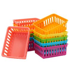 four plastic baskets stacked on top of each other with different colors and sizes in them