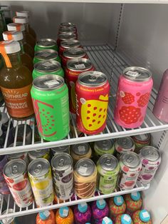 a refrigerator filled with lots of different types of drinks