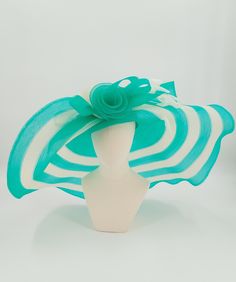 Breathtaking ladies hat perfect for the Kentucky derby. Chic Structured Crown Hat For Kentucky Derby, Chic Kentucky Derby Hat With Structured Crown, Chic Hats With Structured Crown For Races, Chic High Crown Fascinator For Races, Chic High Crown Mini Hat For Races, Kentucky Derby Structured Crown Hat For Races, Chic Mini Hats With High Crown For Races, Chic Costume Hats And Headpieces For Royal Ascot, Elegant Green Sun Hat For Summer