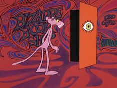 the pink cartoon is standing in front of an orange door