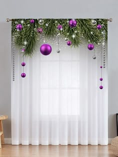 christmas decorations are hanging on the window curtain