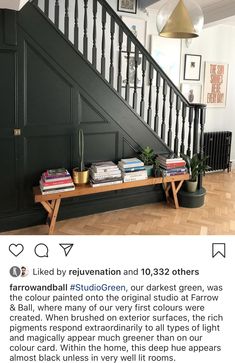 an image of a staircase with books and plants on the shelf in front of it