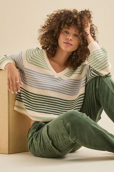 Stay effortlessly stylish with our multi-colored striped sweater. Featuring a flattering V-neck design, it's the perfect blend of comfort and chic, whether you're lounging seaside or heading out for a night under the stars. Striped Knit V-neck Sweater, Trending Sweaters, A Night Under The Stars, Night Under The Stars, Christmas Boots, Altard State, Pattern Sweater, Green Pattern, Altar'd State