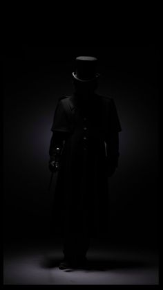 a man with a top hat and coat in the dark