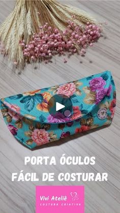 the video is showing how to make an eyeglass case with fabric and flowers on it